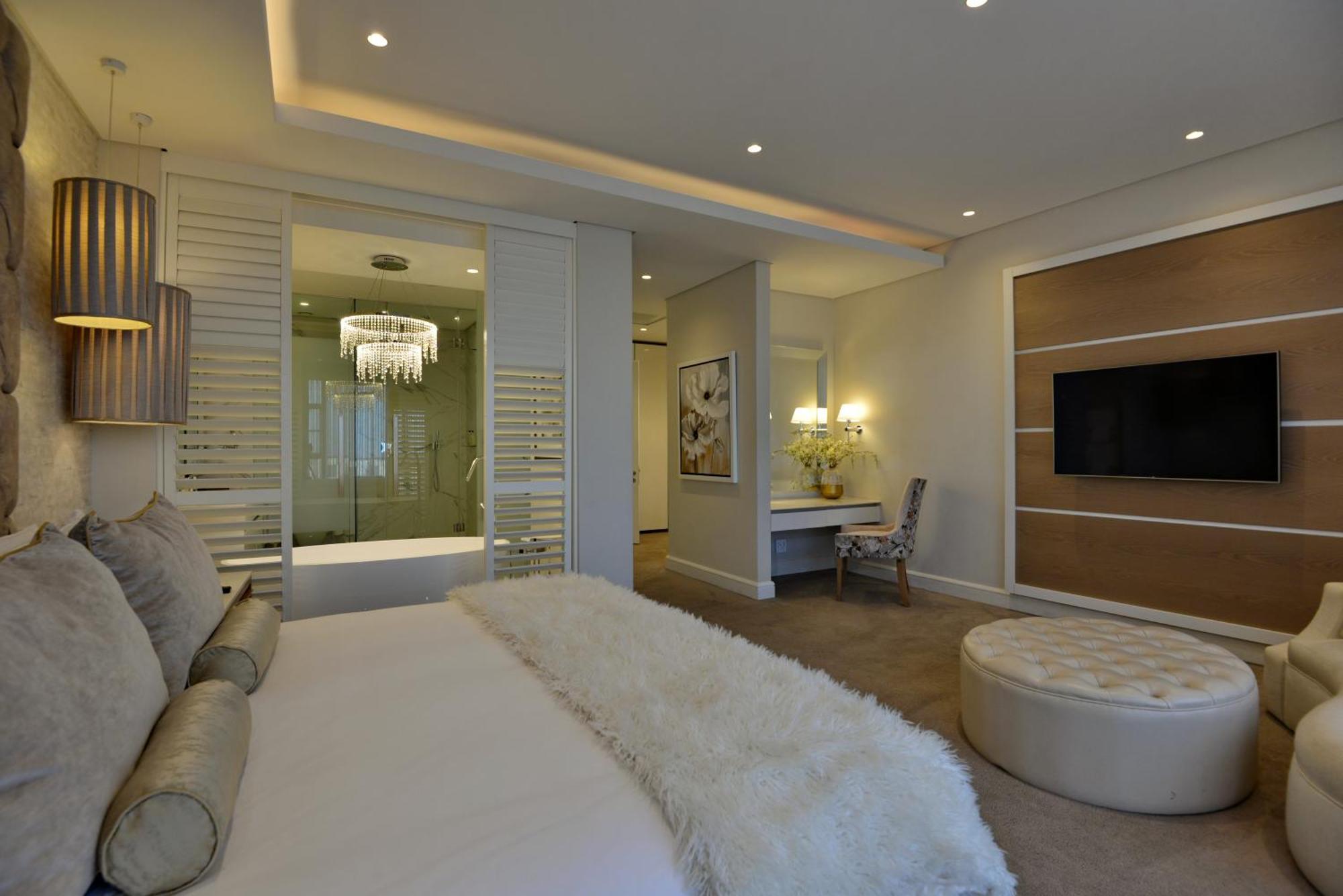 The Houghton Hotel, Spa, Wellness & Golf Johannesburg Phòng bức ảnh A bedroom at The Ivy Hotel