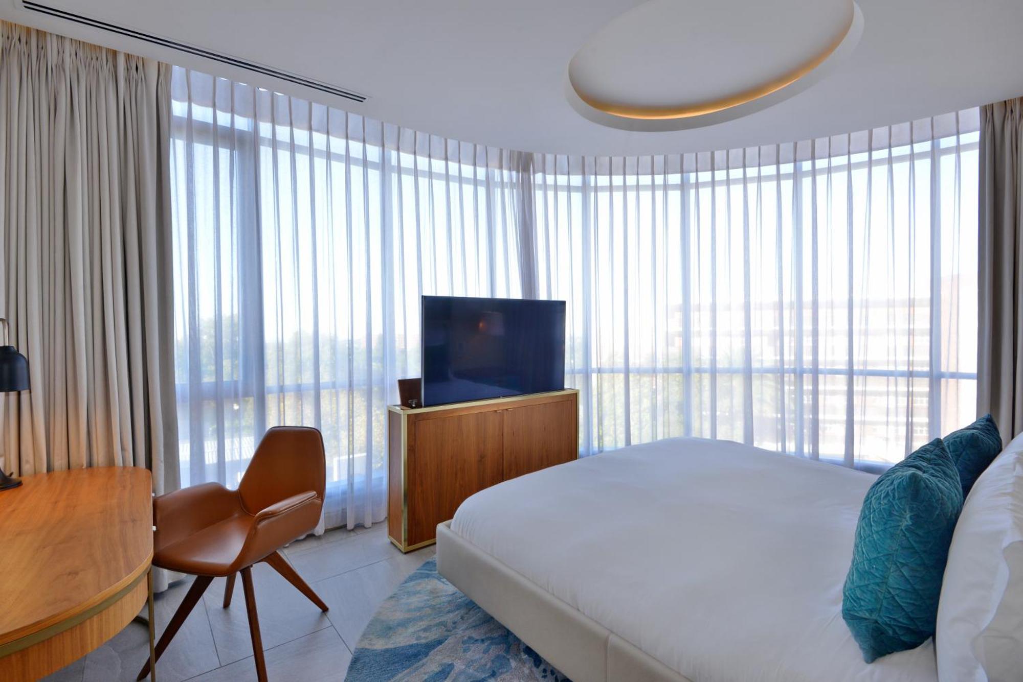The Houghton Hotel, Spa, Wellness & Golf Johannesburg Phòng bức ảnh A bedroom at the hotel